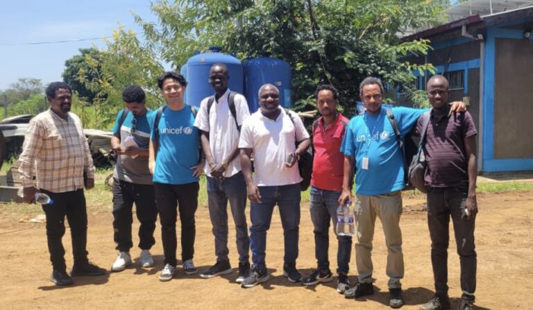 UN Volunteer with colleagues